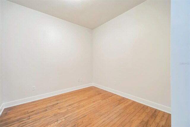 1120 E Kennedy Blvd Unit 615, Tampa, FL 33602 - empty room with light wood-style flooring and baseboards