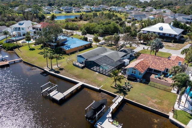 aerial view with a water view and a residential view