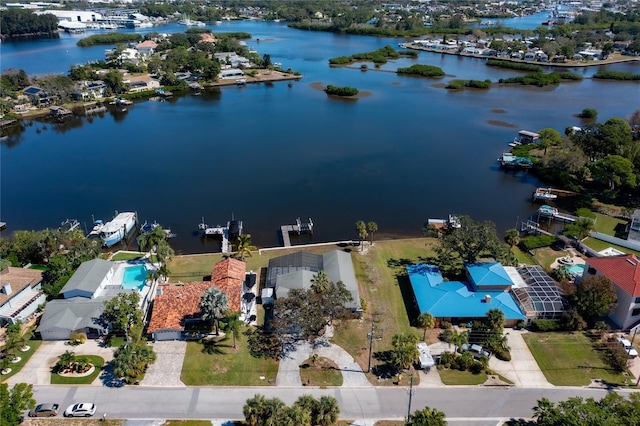 bird's eye view with a water view