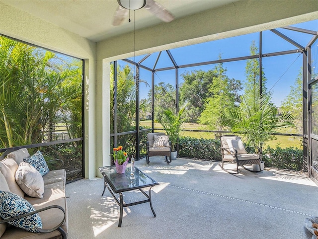 sunroom / solarium with ceiling fan