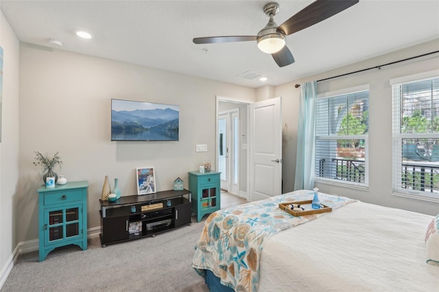 carpeted bedroom with recessed lighting, visible vents, baseboards, and a ceiling fan