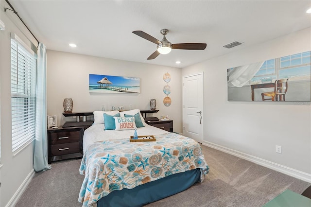 carpeted bedroom with visible vents, baseboards, recessed lighting, and a ceiling fan