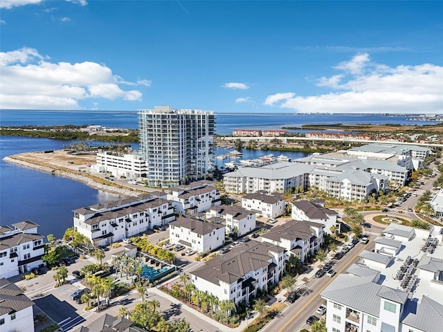 birds eye view of property featuring a water view
