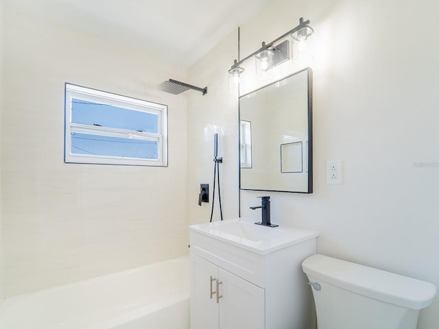 bathroom with  shower combination, vanity, and toilet