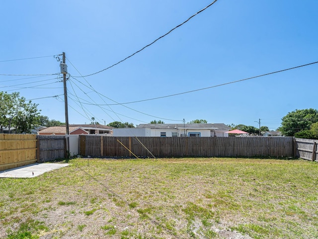 view of yard featuring a fenced backyard
