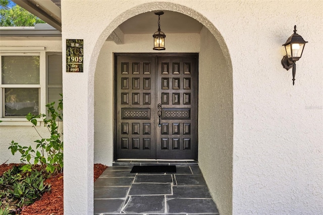 1905 Oro Ct, Clearwater, FL 33764 - view of exterior entry with stucco siding