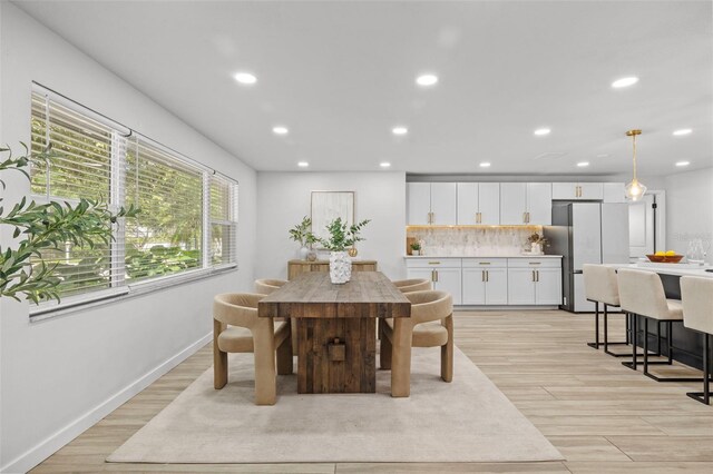 1905 Oro Ct, Clearwater, FL 33764 - dining area featuring baseboards, light wood-type flooring, and recessed lighting