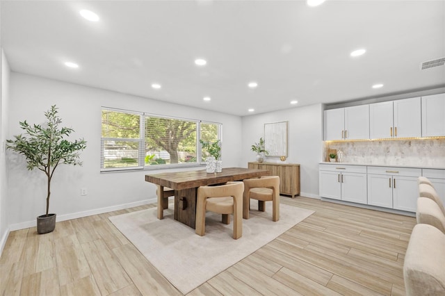 1905 Oro Ct, Clearwater, FL 33764 - dining room with light wood finished floors, baseboards, visible vents, and recessed lighting