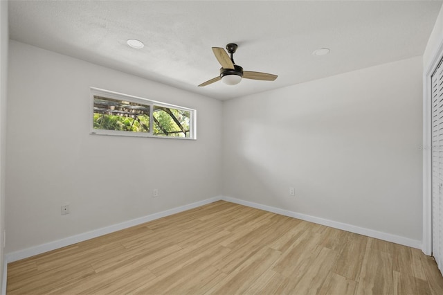 1905 Oro Ct, Clearwater, FL 33764 - empty room with light wood-type flooring, ceiling fan, and baseboards