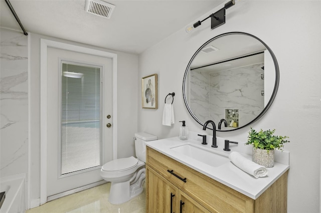 1905 Oro Ct, Clearwater, FL 33764 - bathroom featuring toilet, vanity, and visible vents