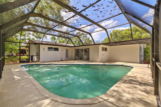 1905 Oro Ct, Clearwater, FL 33764 - outdoor pool with a patio area and glass enclosure