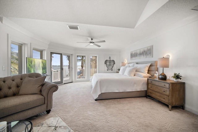 bedroom with light carpet, access to exterior, ceiling fan, and visible vents
