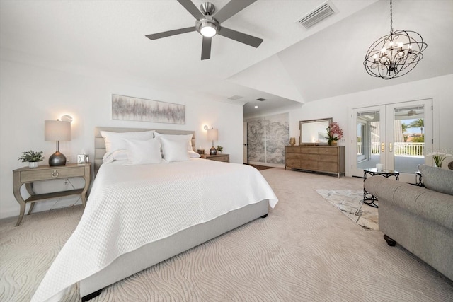 bedroom featuring light carpet, access to exterior, lofted ceiling, and visible vents