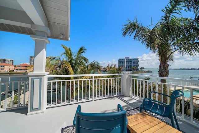 balcony featuring a water view