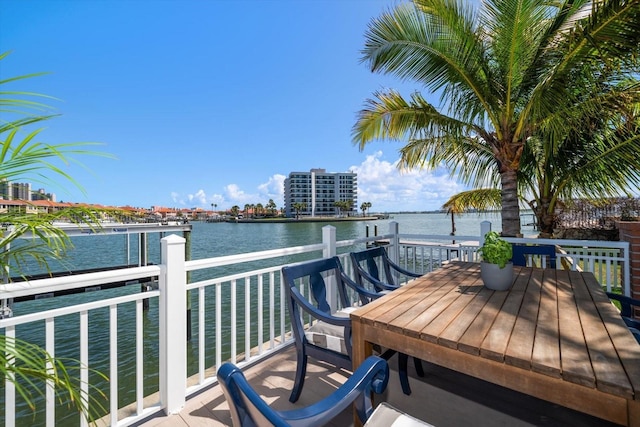 wooden deck featuring a water view