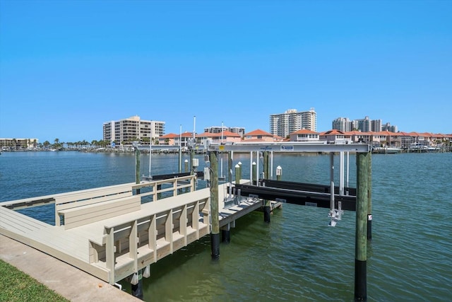 dock area featuring a water view and boat lift