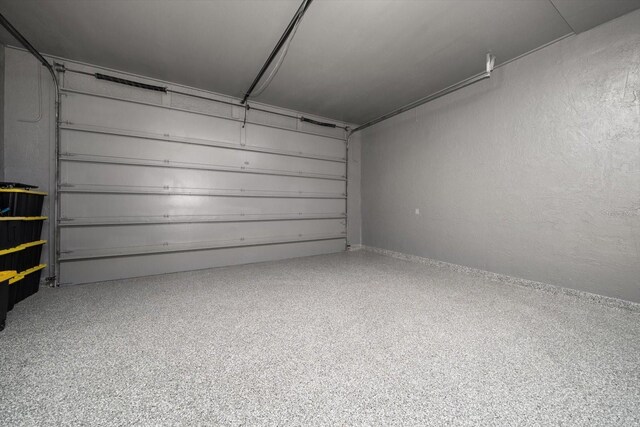 garage with a textured wall