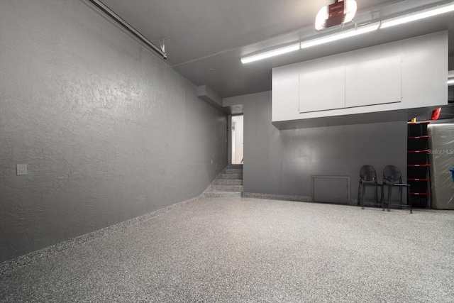garage with a textured wall