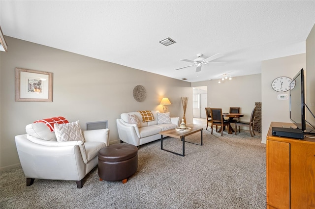 6920 Lafayette N Unit 6920, Pinellas Park, FL 33781 - living area featuring ceiling fan, baseboards, visible vents, and carpet floors