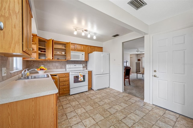 6920 Lafayette N Unit 6920, Pinellas Park, FL 33781 - kitchen featuring white appliances, open shelves, visible vents, decorative backsplash, and a sink