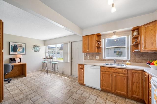 6920 Lafayette N Unit 6920, Pinellas Park, FL 33781 - kitchen featuring tasteful backsplash, stone finish floor, open shelves, a sink, and white dishwasher