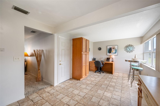 6920 Lafayette N Unit 6920, Pinellas Park, FL 33781 - office featuring stone finish flooring, baseboards, and visible vents
