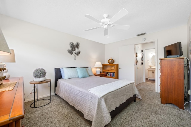 6920 Lafayette N Unit 6920, Pinellas Park, FL 33781 - bedroom featuring baseboards, a ceiling fan, connected bathroom, visible vents, and carpet
