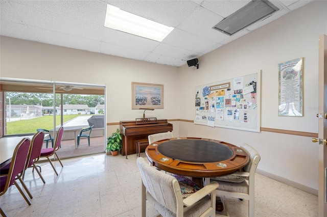 6920 Lafayette N Unit 6920, Pinellas Park, FL 33781 - dining area with baseboards, a drop ceiling, and light floors