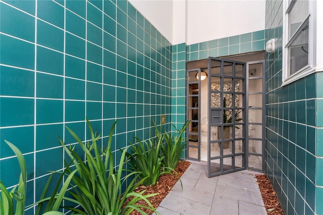 bathroom with tile patterned flooring