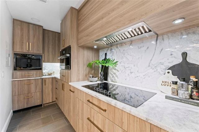 kitchen with black appliances, recessed lighting, light countertops, custom range hood, and backsplash