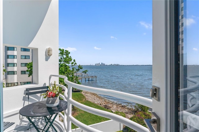 balcony featuring a water view