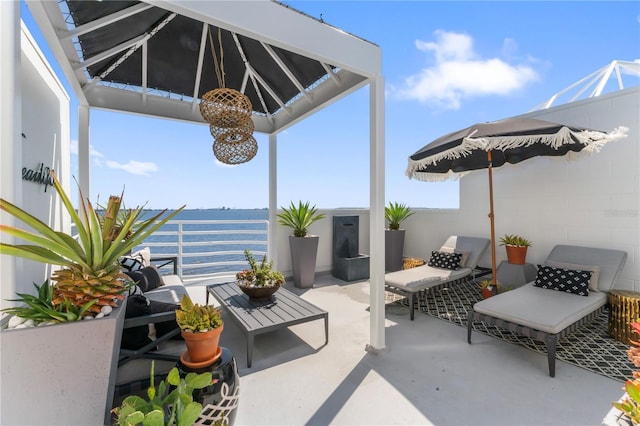 view of patio / terrace with a water view