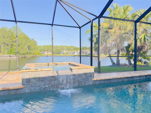 view of swimming pool featuring an in ground hot tub, a water view, and glass enclosure