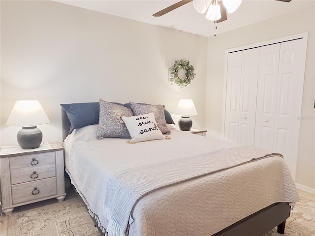 bedroom featuring a closet and ceiling fan