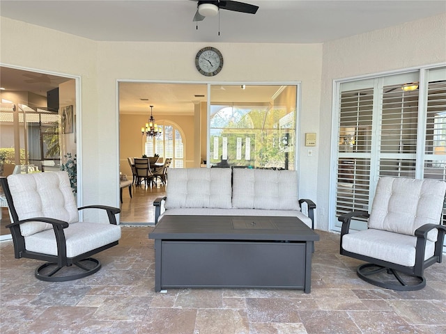 view of patio featuring a ceiling fan and an outdoor hangout area
