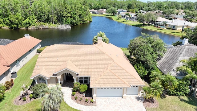 bird's eye view with a water view and a residential view