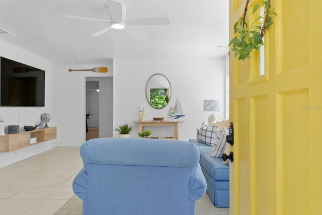 2215 Thrace St, Tampa, FL 33605 - living area with ceiling fan and light tile patterned flooring