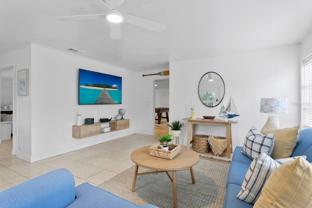2215 Thrace St, Tampa, FL 33605 - living room with tile patterned flooring and a ceiling fan