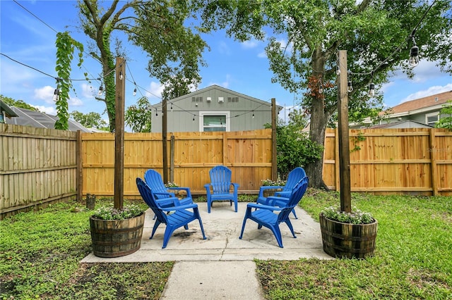 2215 Thrace St, Tampa, FL 33605 - view of patio with a fenced backyard