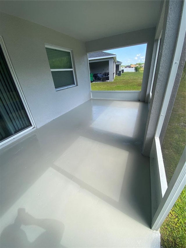 view of patio / terrace featuring an attached carport