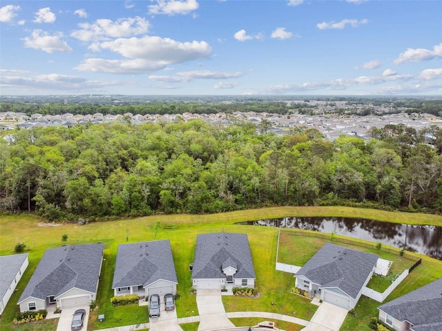 bird's eye view with a water view and a residential view