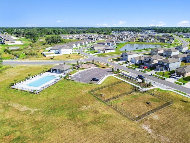 aerial view with a water view and a residential view