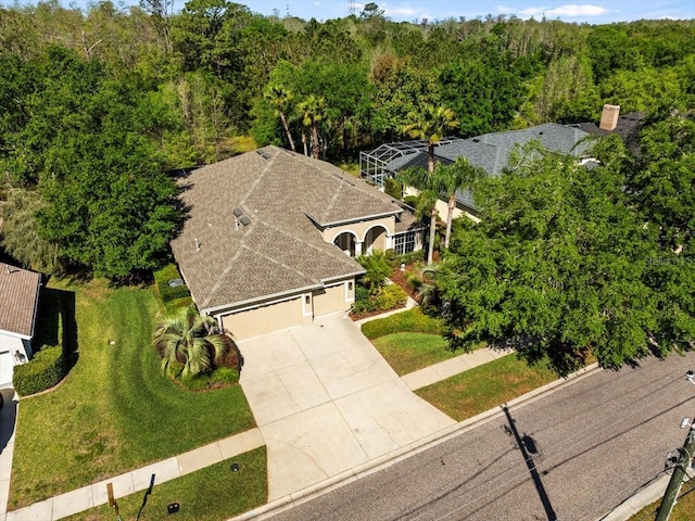 bird's eye view with a view of trees