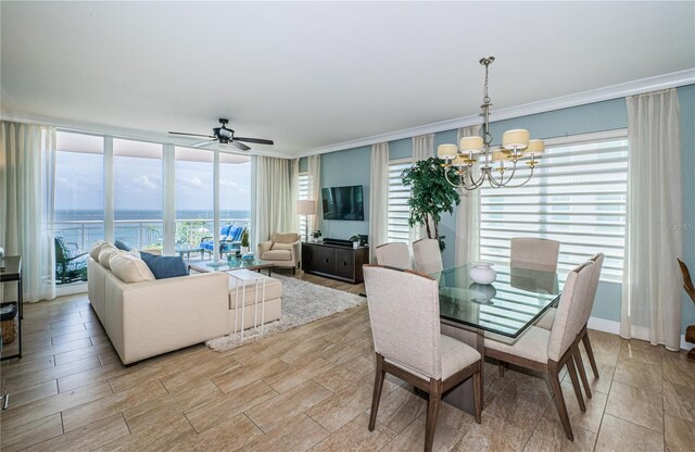1325 Snell Isle Blvd NE Unit 607, Saint Petersburg, FL 33704 - dining area featuring a chandelier, crown molding, and a ceiling fan