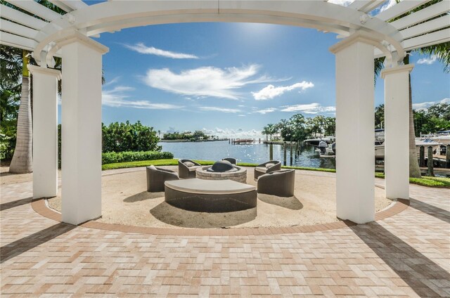 1325 Snell Isle Blvd NE Unit 607, Saint Petersburg, FL 33704 - view of patio with a water view and a pergola