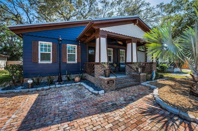 525 Lexington St, Dunedin, FL 34698 - view of front of home featuring a porch