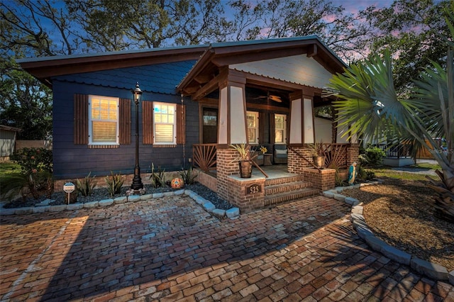 525 Lexington St, Dunedin, FL 34698 - view of front of property featuring covered porch