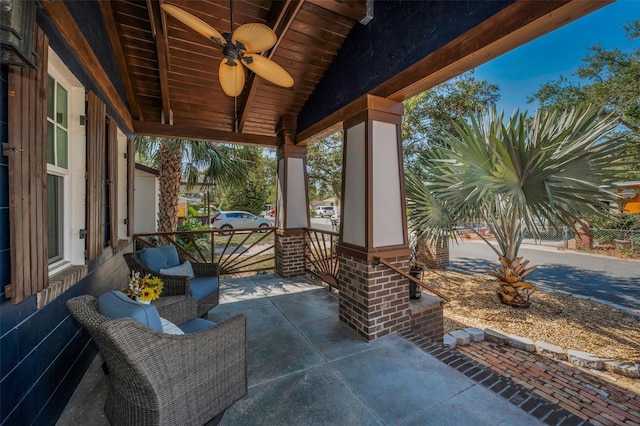 525 Lexington St, Dunedin, FL 34698 - covered porch featuring a ceiling fan