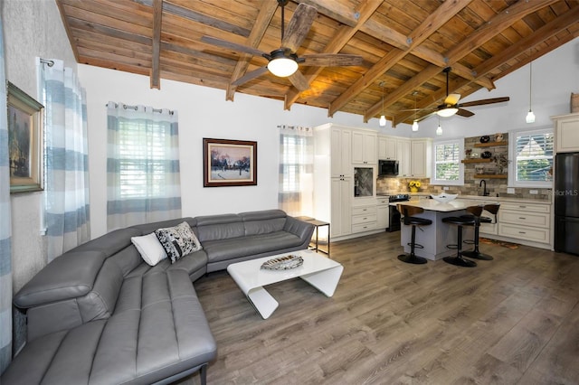 525 Lexington St, Dunedin, FL 34698 - living area featuring ceiling fan, wooden ceiling, and dark wood-type flooring