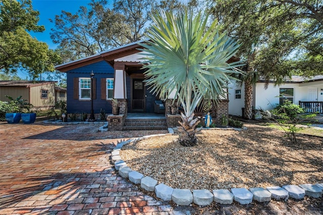 525 Lexington St, Dunedin, FL 34698 - view of front of home with covered porch